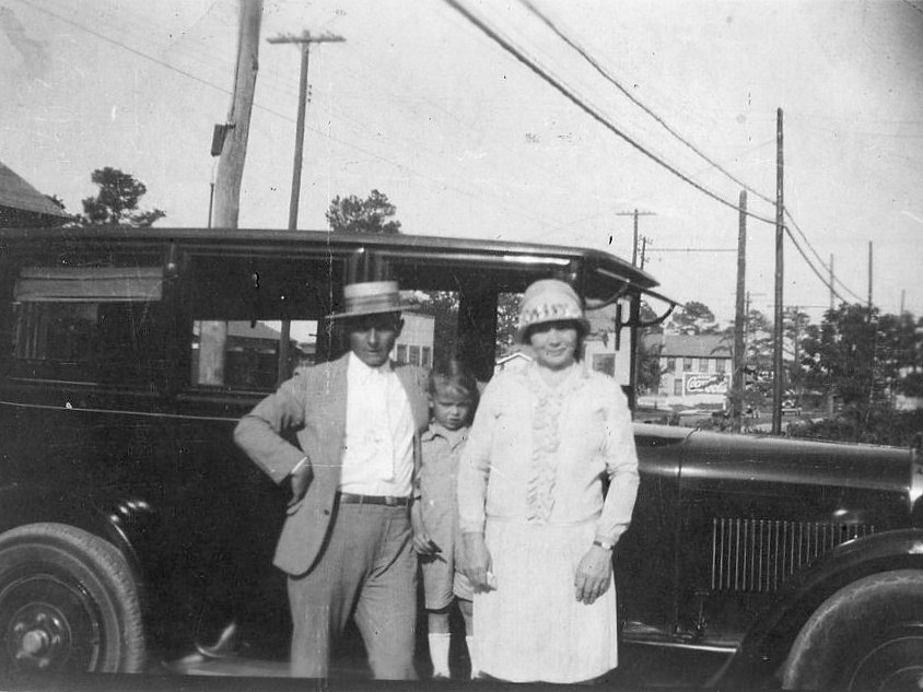 Family by their car