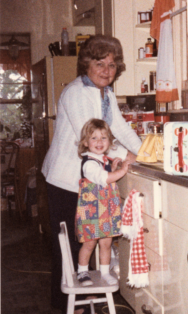 Lydia and Rachel do dishes.