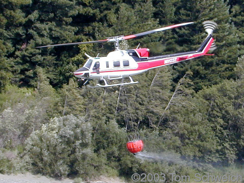 Helicopter takes water from the Eel River