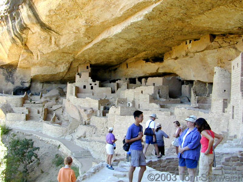 Cheryl talks with two young people from the Bay Area at the Cliff Palace.