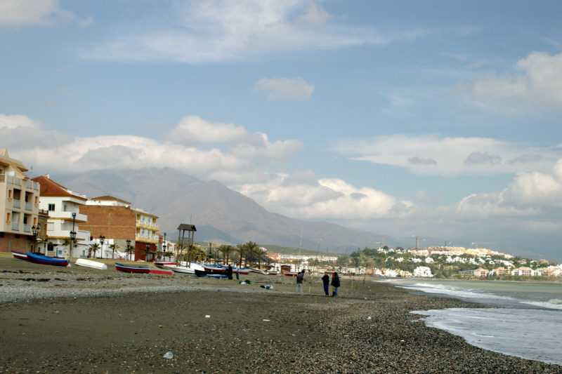 The beach at San Luis de Sabinillas with the Sierra Bermeja in the background.