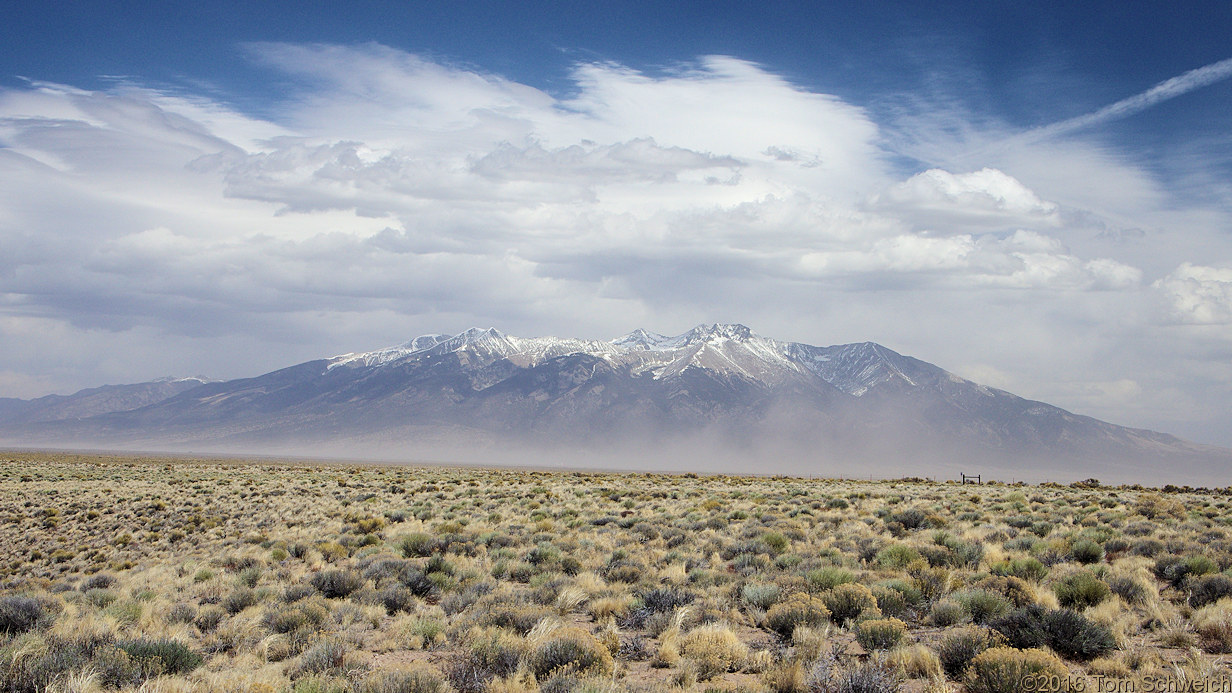 Blowing sand with Sierra Blanca in the background