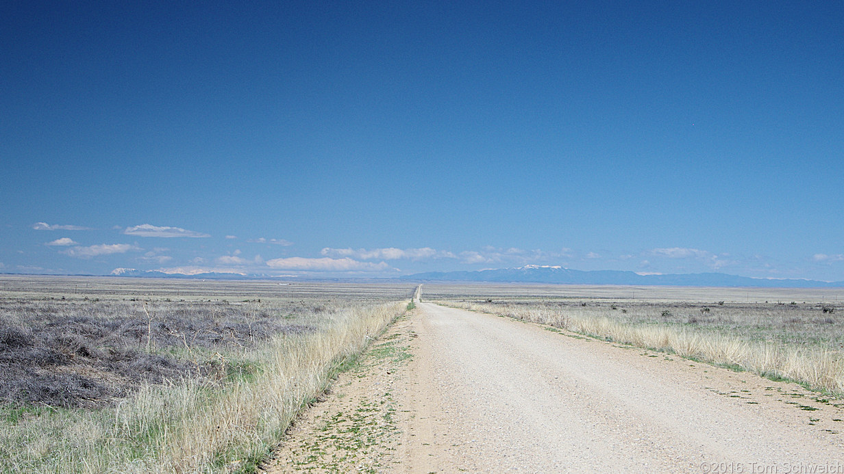 The Rocky Mountains, 100 miles away.