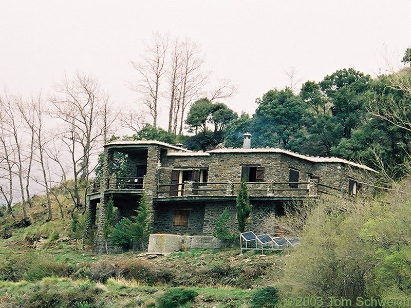 House above the road.